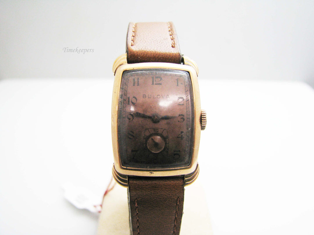b406 Men's 14kt Rose Gold Mechanical Bulova wristwatch