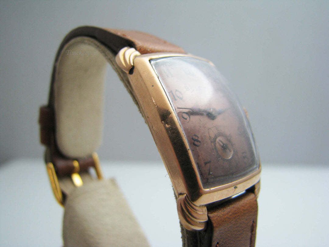 b406 Men's 14kt Rose Gold Mechanical Bulova wristwatch