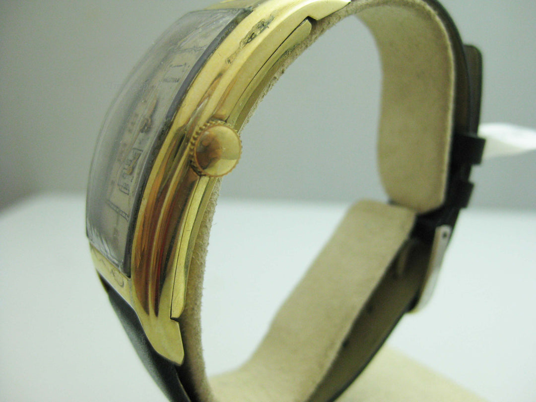 b702 Men's Vintage 10kt Gold Filled Waltham Curved Mechanical Wristwatch