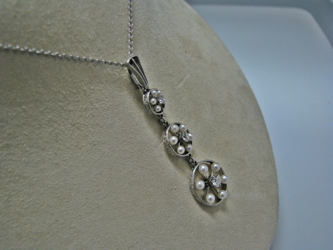 H135 Gorgeous Graduated Three Diamond Platinum Necklace with Seed Pearls