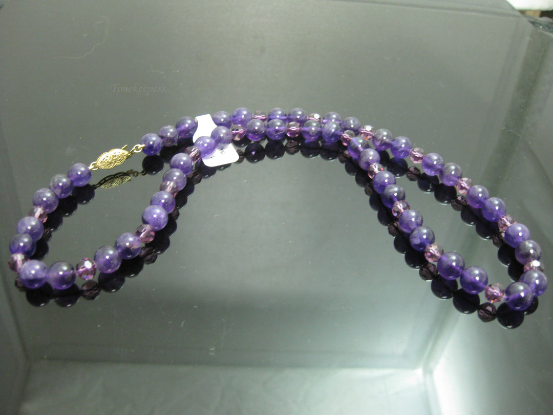 c037 Gorgeous Strand of Purple Beads with a Removable Heart Shaped Amethyst in 14k