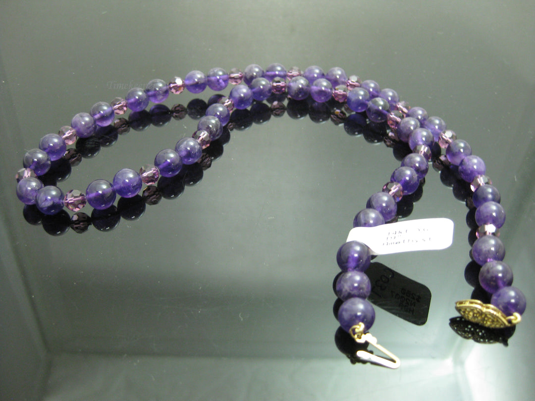 c037 Gorgeous Strand of Purple Beads with a Removable Heart Shaped Amethyst in 14k