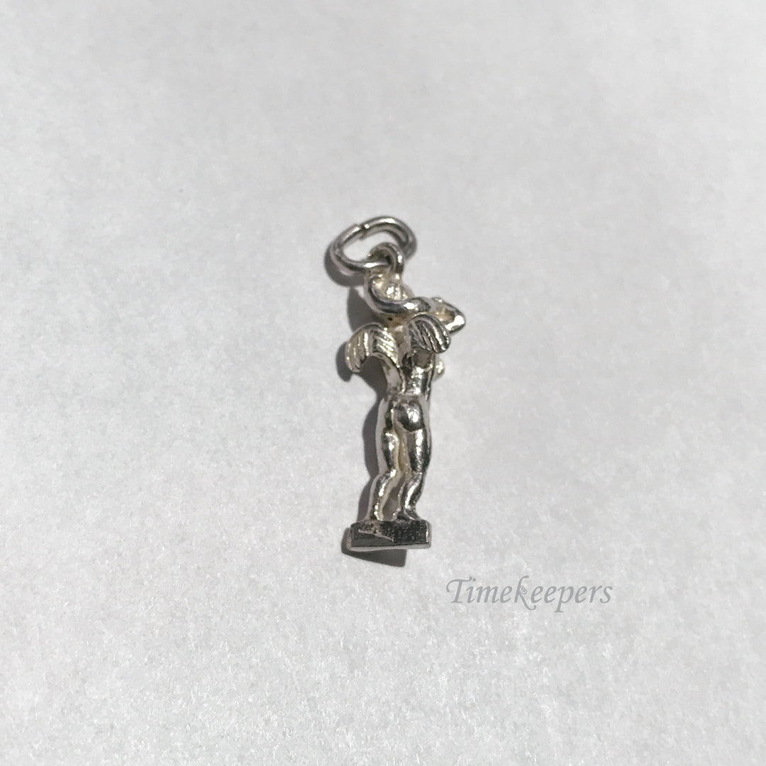 e102 Vintage Sterling Silver Cupid Charm Pendant