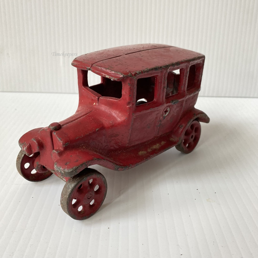 m104 Vintage Collectible Figurine Cast Iron Car Red Paint Rolling Wheels