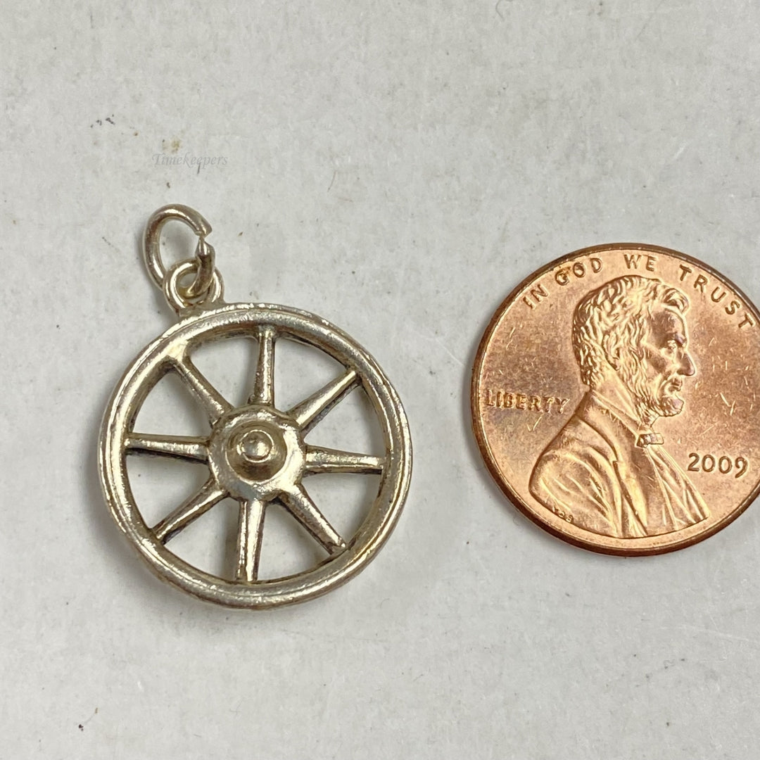 m299 Vintage Sterling Silver Mini Wheel Charm Pendant