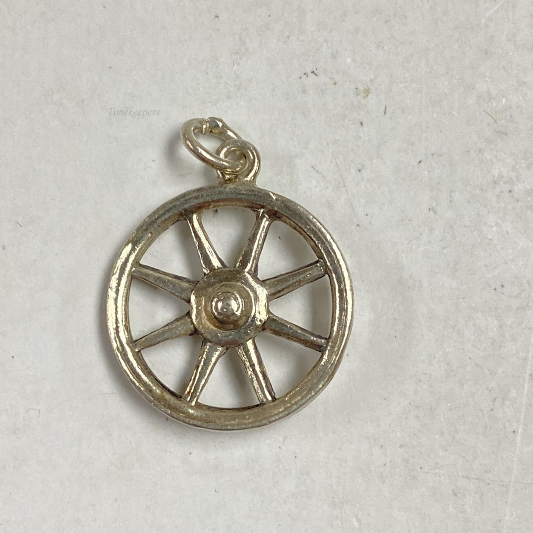 m299 Vintage Sterling Silver Mini Wheel Charm Pendant