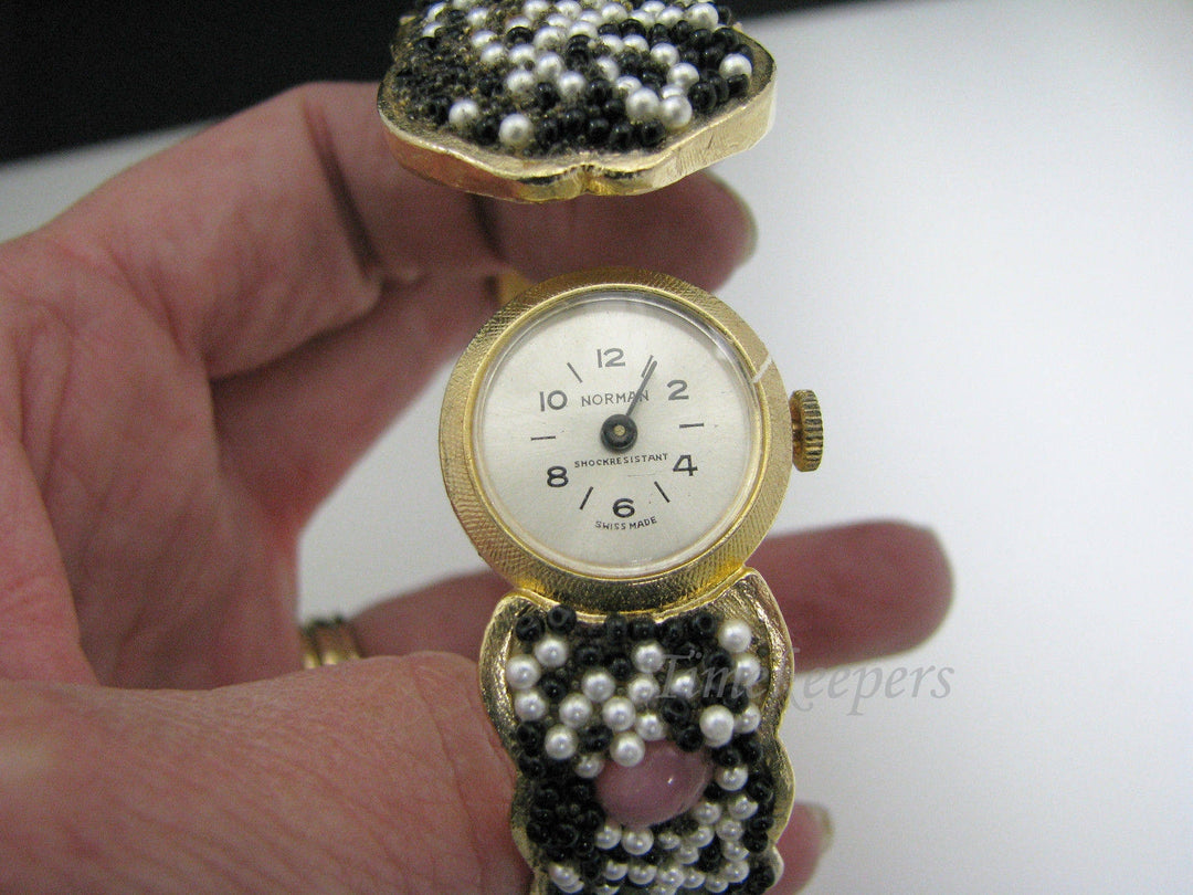 a922 Vintage Snap Open Bracelet Watch by Norman -Band is Adorned with Beads