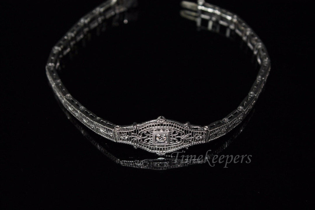 a180 Vintage 1920's Diamond Bracelet in 14K White Gold with Flowers down the Band