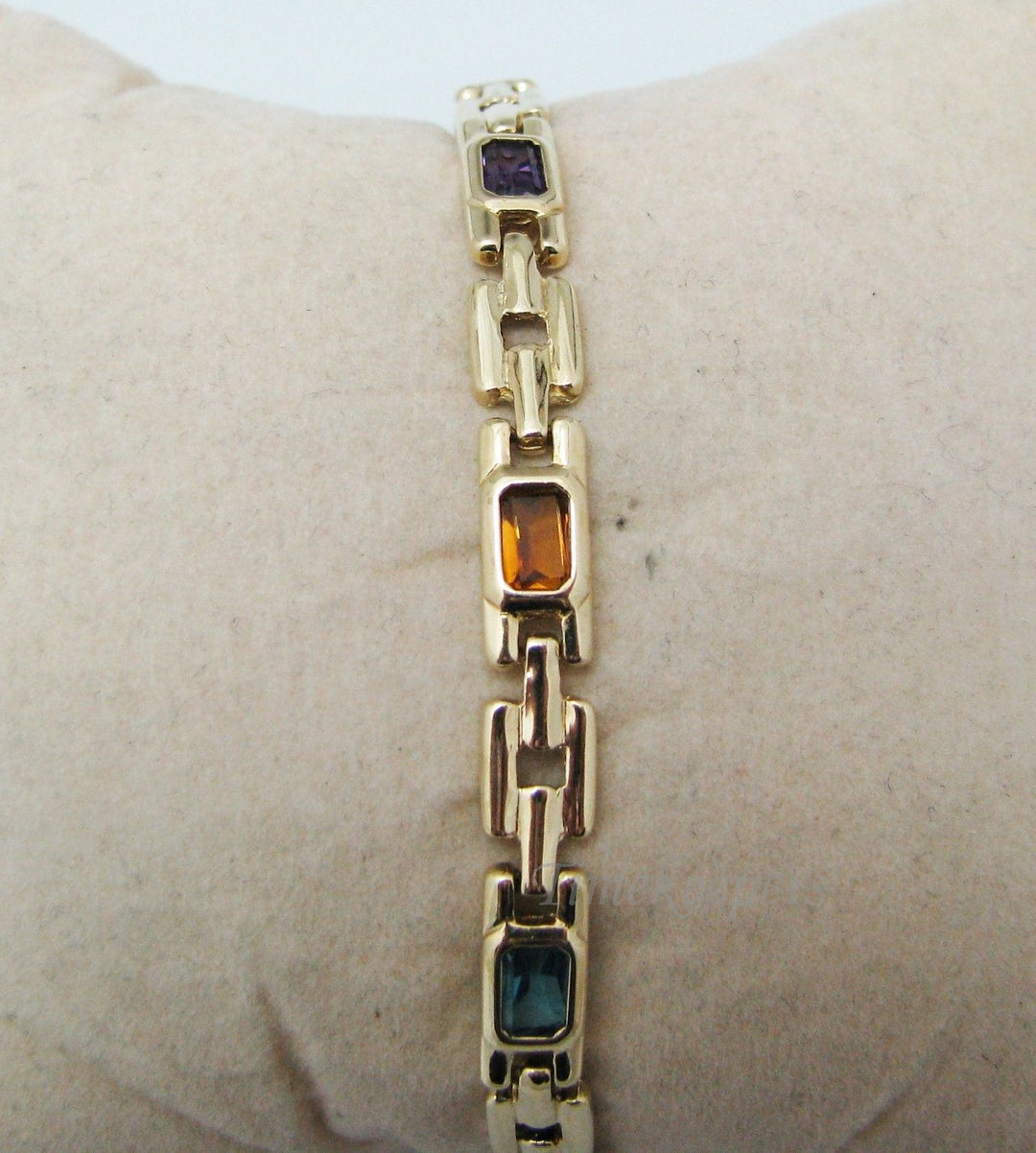 a401 14k Yellow Gold Bracelet with Emerald Cut Gemstones