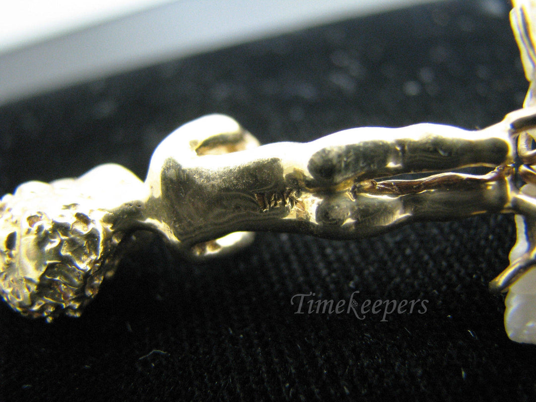 a740 Vintage 14k Yellow Gold Boy with Sapphire Eyes Holding a Present