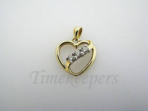 c130 Beautiful 10k Gold Heart Pendant with a Ribbon of 3 Diamonds Across