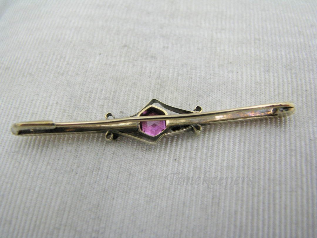 a1118 Pretty Vintage 10k Yellow Gold Bar Brooch with a Center Pink Stone