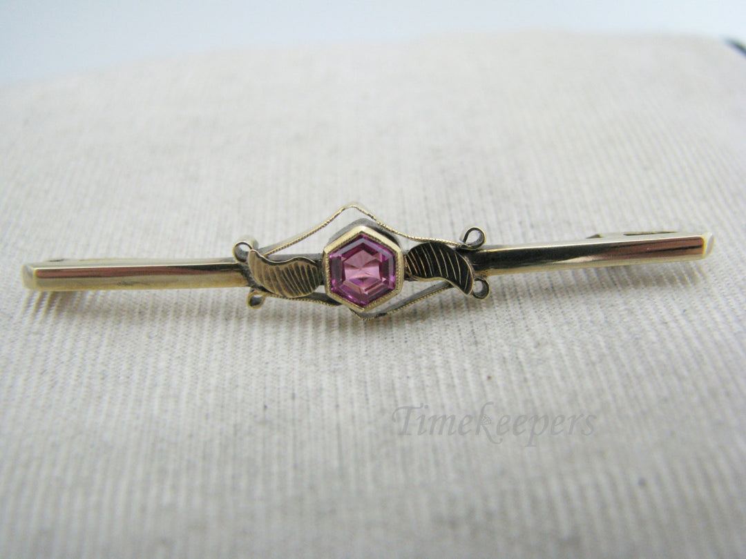 a1118 Pretty Vintage 10k Yellow Gold Bar Brooch with a Center Pink Stone