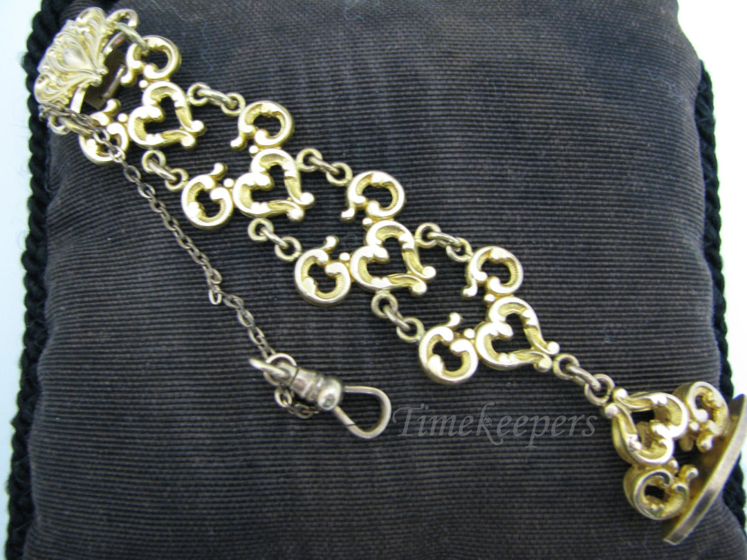 c086 Vintage Pocket Watch Chain Featuring Filigree Links on a Waist Clip