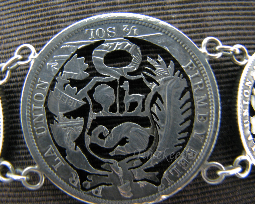 j147 Lovely Peru Cut Out Graduated Coin Bracelet