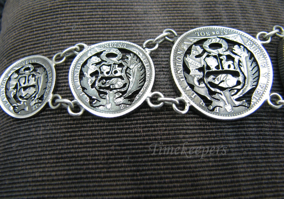 j147 Lovely Peru Cut Out Graduated Coin Bracelet