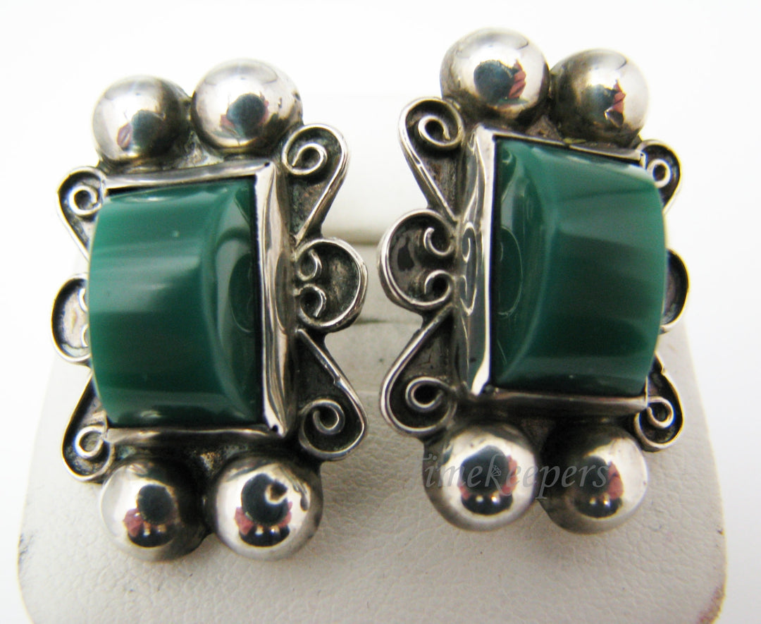 c240 Unique Sterling Silver Clip On Earrings with Domed Green Stone