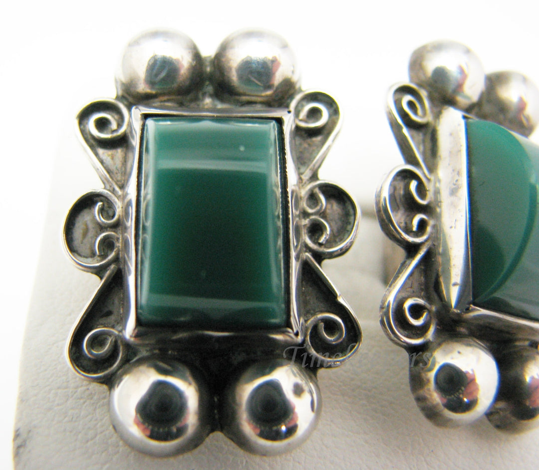 c240 Unique Sterling Silver Clip On Earrings with Domed Green Stone