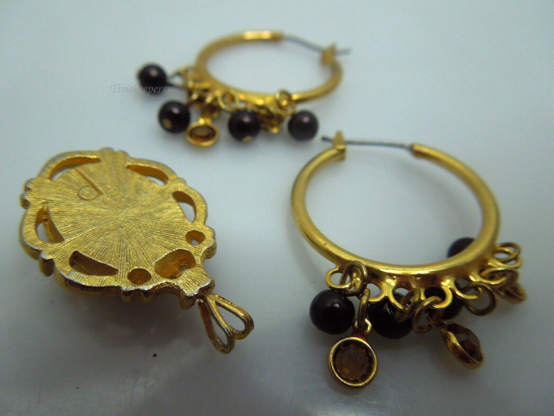 s822 Pretty pair of Gold tone Hoop Earrings and One Pendant