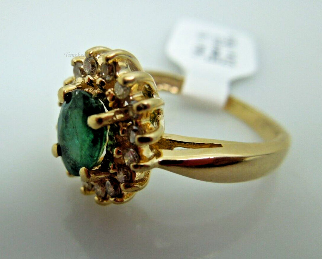 s862 14kt Yellow GOld Emerald Diamond .16cts Ring Size 5(US)