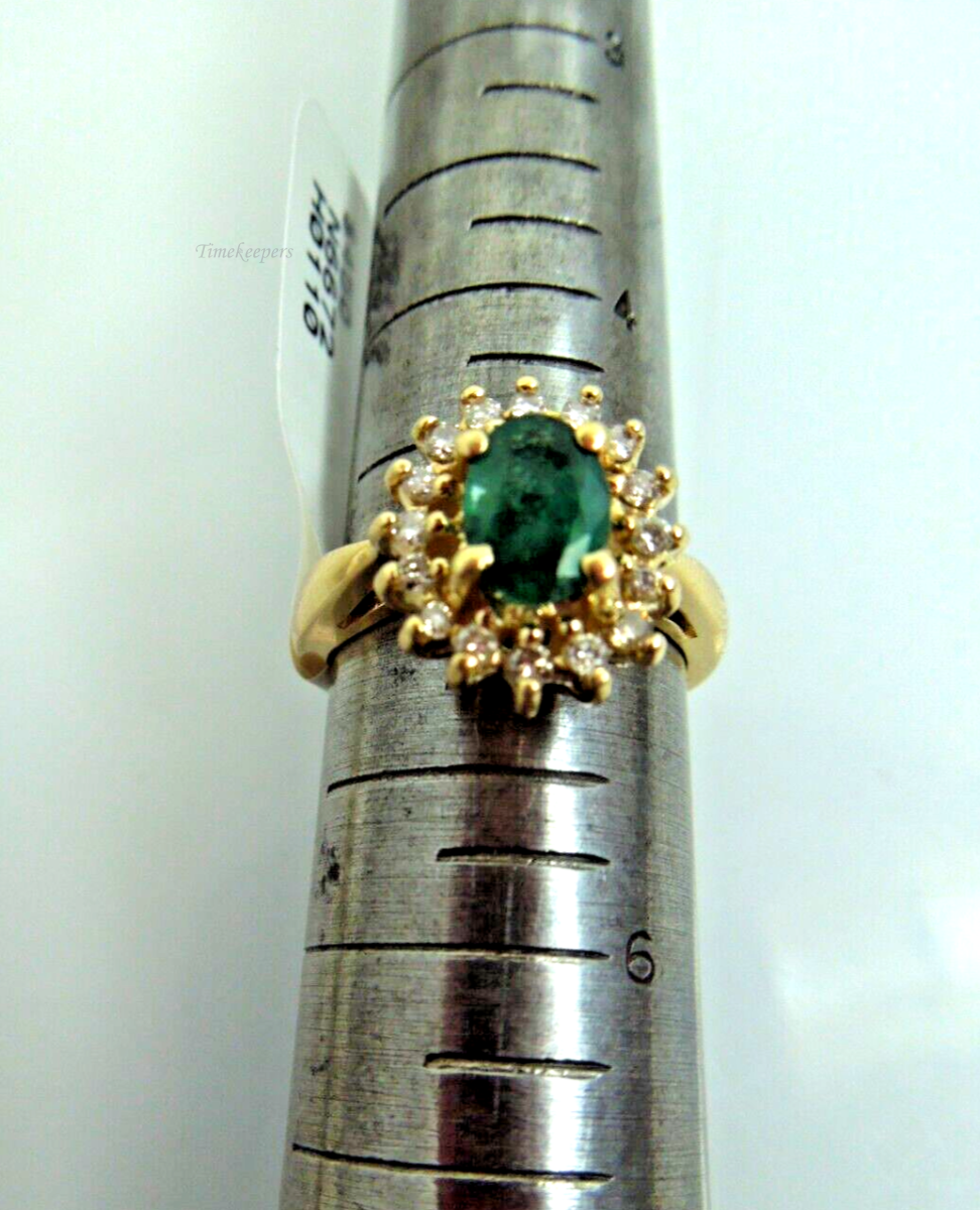 s862 14kt Yellow GOld Emerald Diamond .16cts Ring Size 5(US)