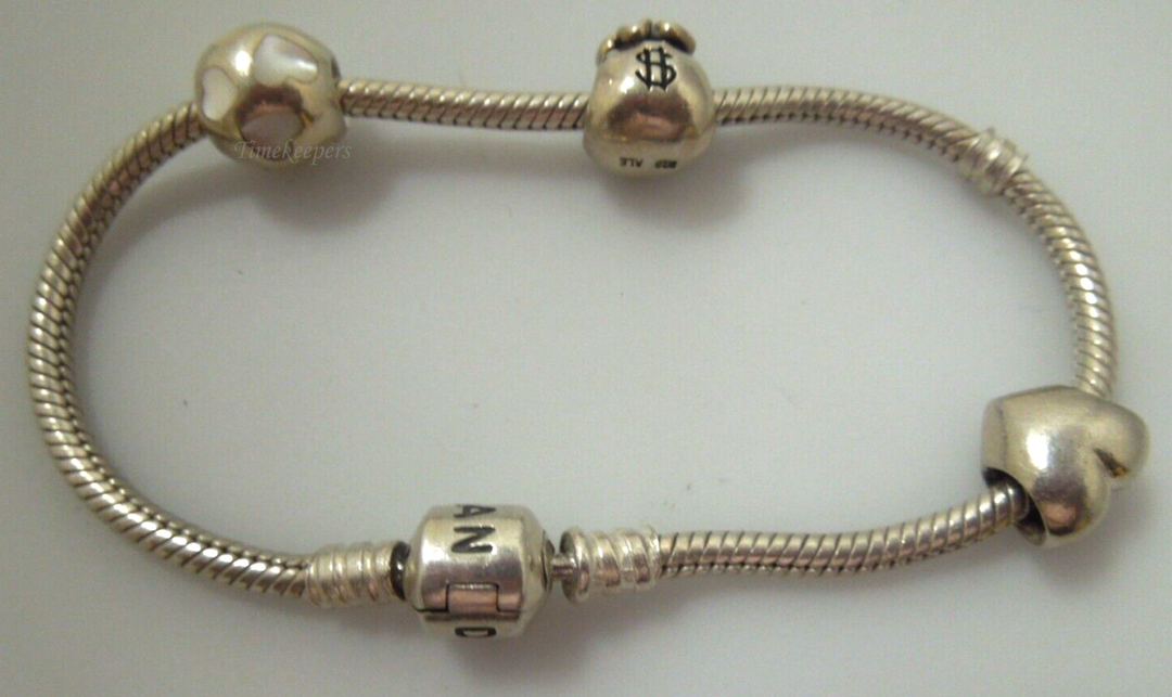 s351 Authentic Pandora Sterling Silver Bracelet with cute charms