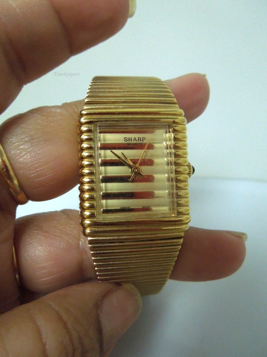 t033 Sharp Japan Movement Gold tone Quartz Watch