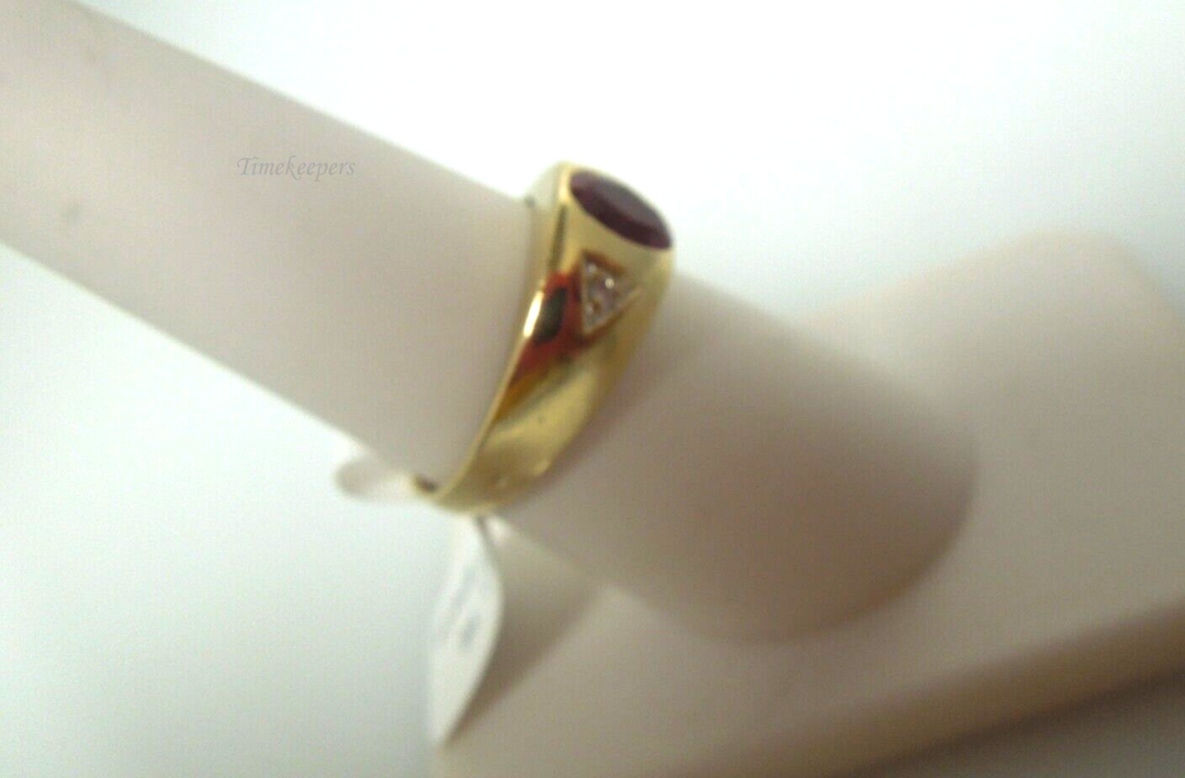 s122 Garnet and  Diamond Ring in 10kt Yellow Gold Ring Size 7.25(US)  