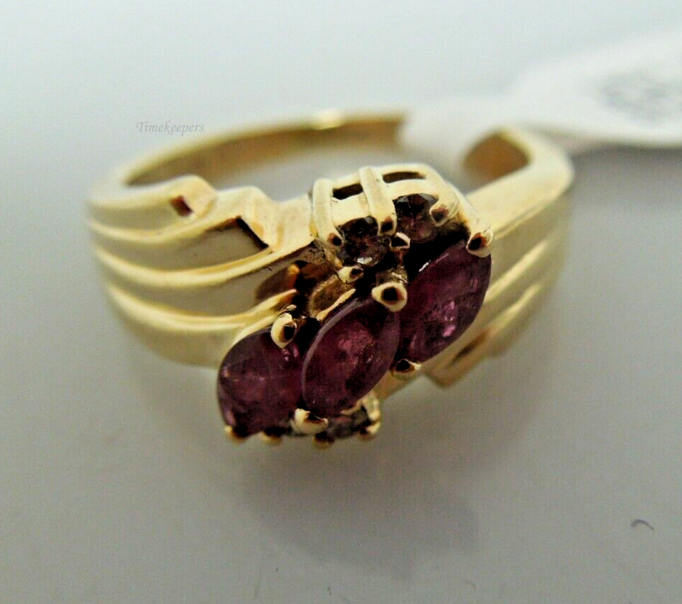 s857 14kt Solid Yellow Gold Ruby Diamond .02 cts Ring Size  5.25(US) Signed