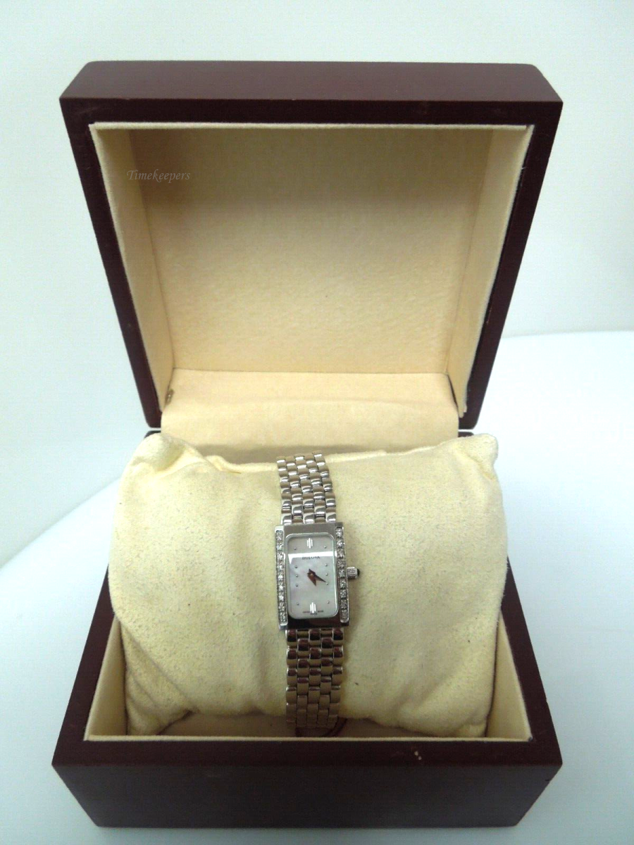 s211 Bulova 14kt white gold ladies diamond wristwatch. Quartz movement.