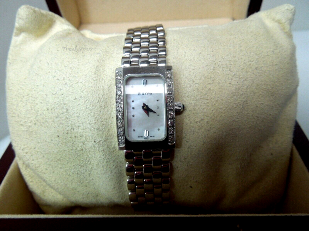 s211 Bulova 14kt white gold ladies diamond wristwatch. Quartz movement.