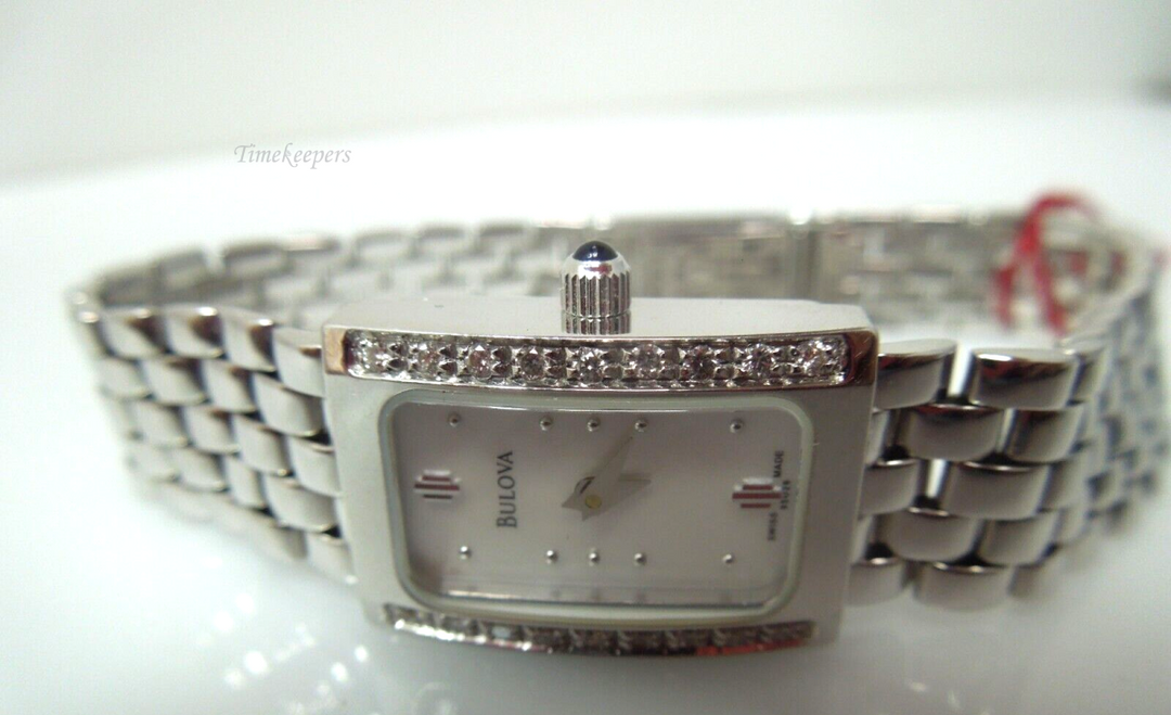 s211 Bulova 14kt white gold ladies diamond wristwatch. Quartz movement.