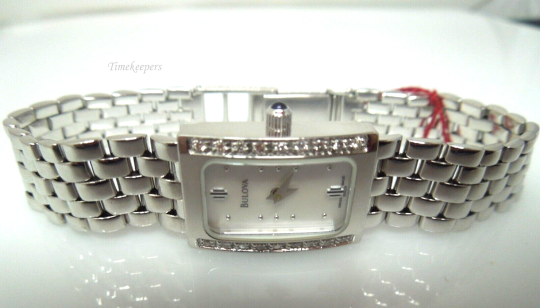 s211 Bulova 14kt white gold ladies diamond wristwatch. Quartz movement.