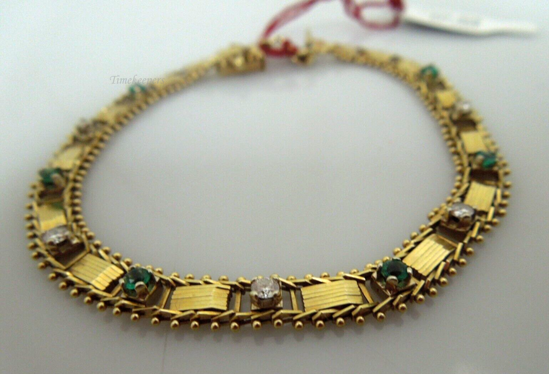 t087 14kt Yellow Gold Emerald Diamond Bracelet