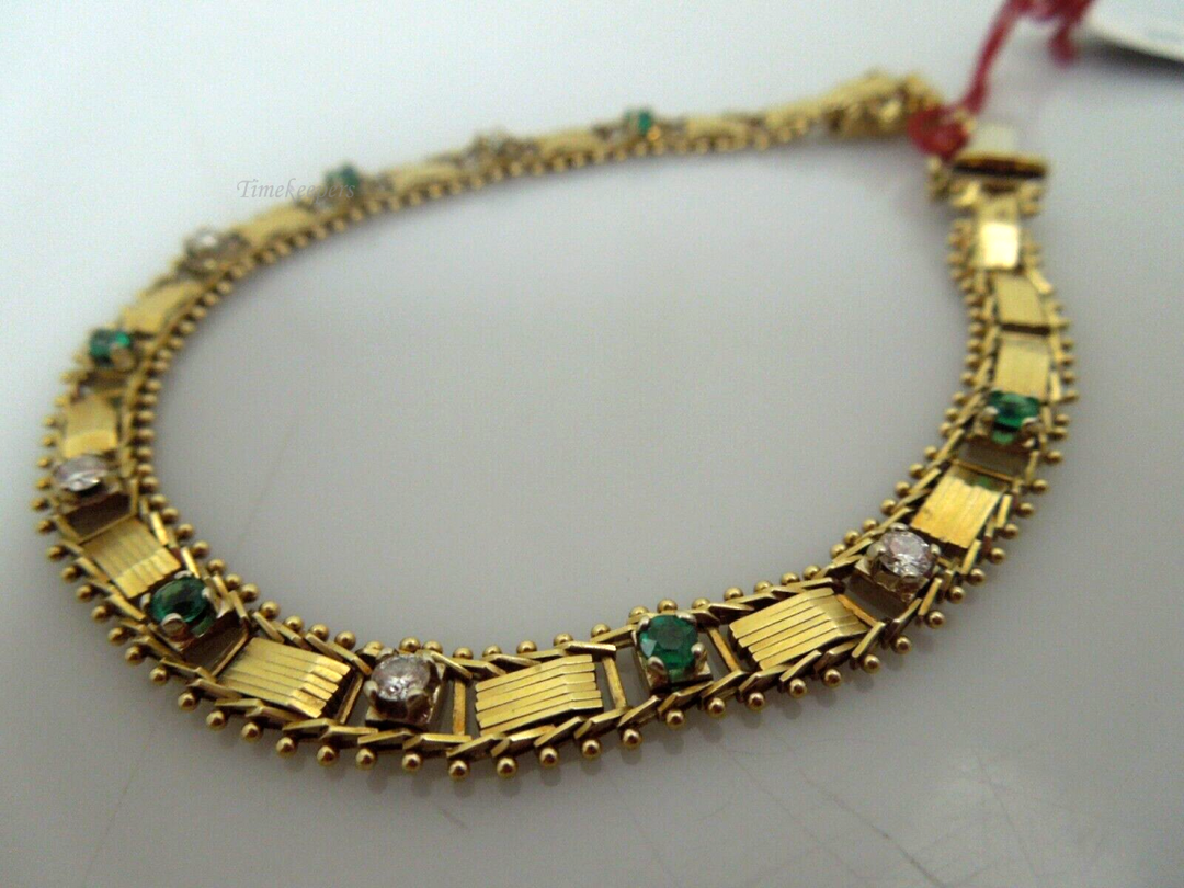 t087 14kt Yellow Gold Emerald Diamond Bracelet