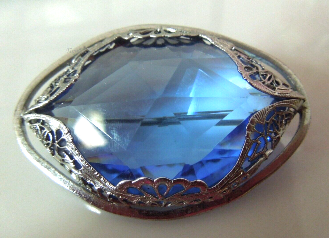 t121 Vintage Silver Tone Filigree Blue Glass Bezeled Stone Brooch Pin  