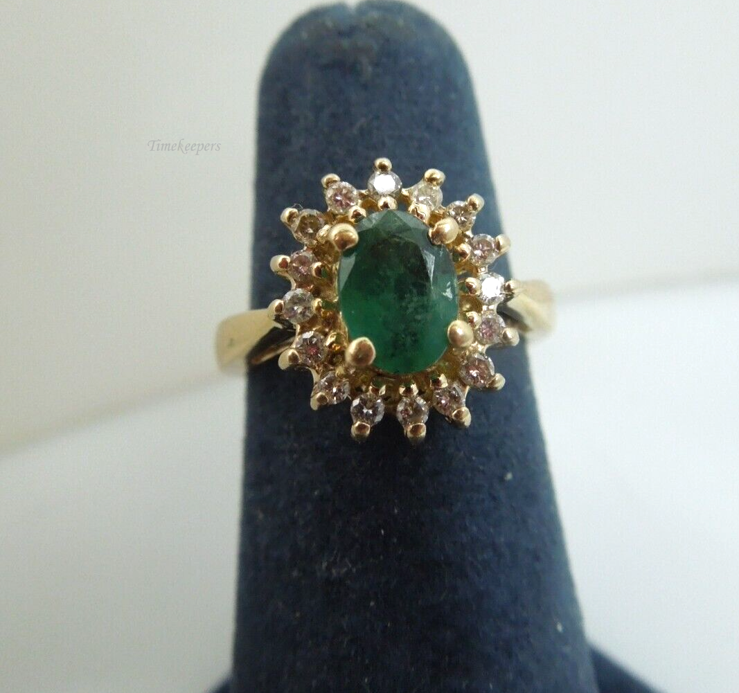 s862 14kt Yellow GOld Emerald Diamond .16cts Ring Size 5(US)